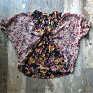 Beautiful semi sheer batwing top by black poppy